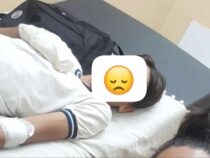 Zwei Finger für ein kaputtes Handy